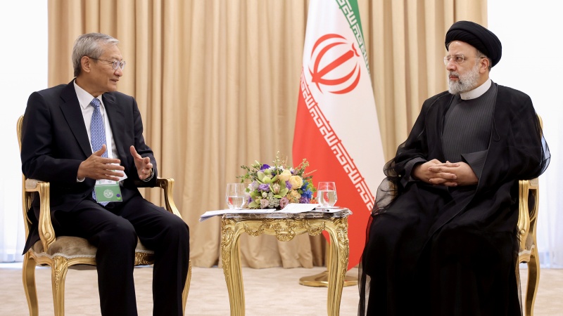 Iranpress: الأمين العام لمنظمة شنغهاي للتعاون يلتقي الرئيس الإيراني