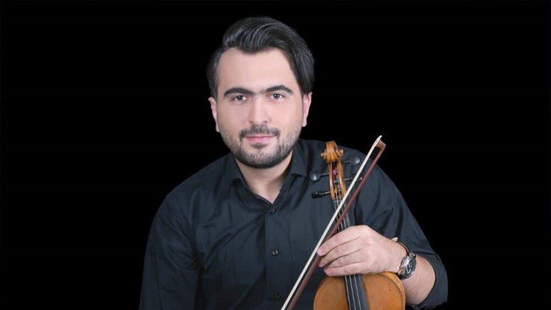 Iranpress: موسيقار إيراني يصل إلى نهائيات مسابقة الكمان العالمية باليابان