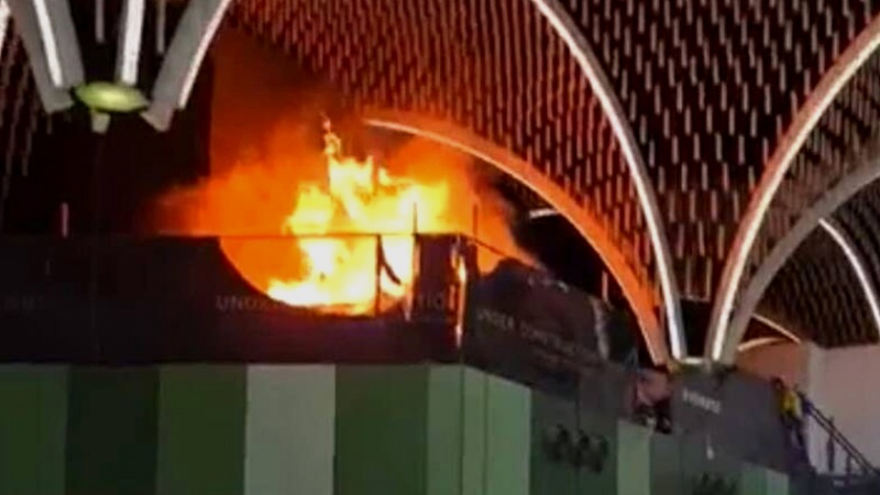 Iranpress: حریق مطار بغداد.. الدفاع المدني يسيطر على الحريق