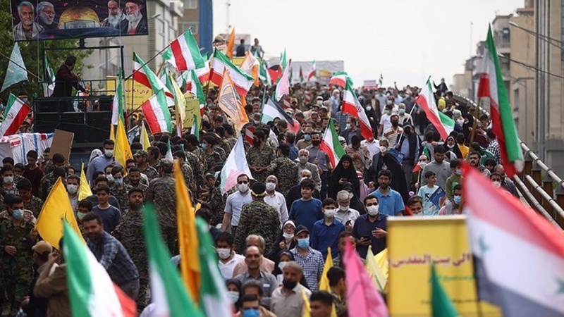 Iranpress: مسيرات يوم القدس العالمي في إيران من عدسة وكالة إيران برس للأنباء