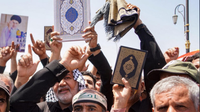 Iranpress: العراقيون يدينون تدنيس القرآن الكريم في الدنمارك