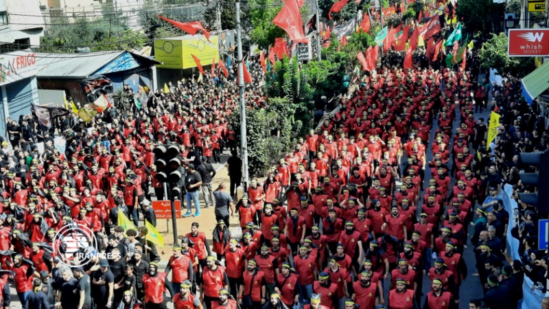 Iranpress: شاهد .. مسيرة عاشورائية لحزب الله اللبناني في الضاحية الجنوبية  لبيروت