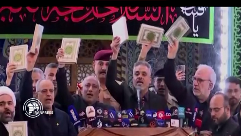 Iranpress: زوار الإمام الحسين (ع) يدينون الإساءة للقرآن الكريم + فيديو