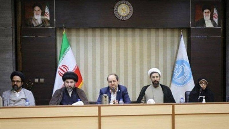 Iranpress: التعاون العلمي بين جامعة طهران والحشد الشعبي