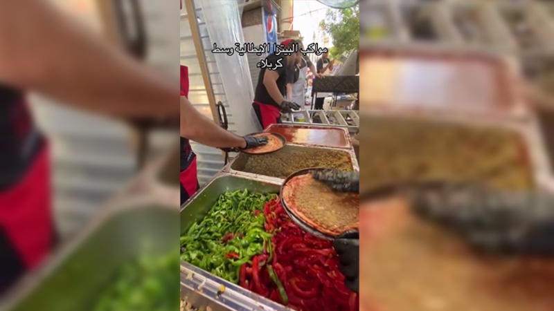 Iranpress: شاهد.. مواكب البيتزا الإيطالية في كربلاء