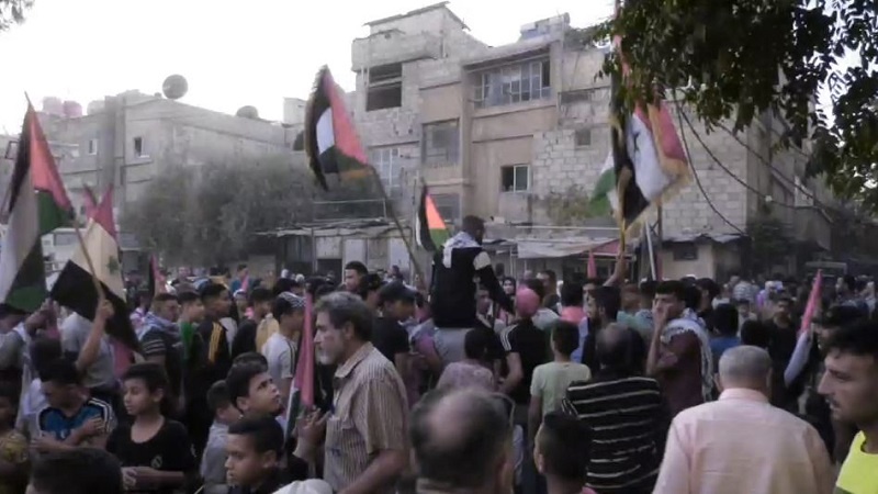 Iranpress: وقفة تضامنية مع المقاومة الفلسطينية في دمشق