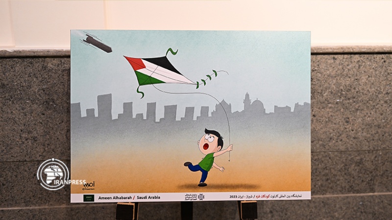 Iranpress: معرض الكاريكاتير بمدينة شيراز.. التضامن مع الأطفال في غزة