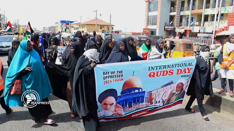 Iranpress: هجوم الشرطة النيجيرية على المشاركين في مسيرة احياء يوم القدس العالمي